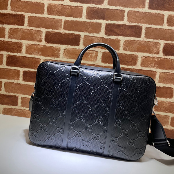 G*u*i gg embossed briefcase